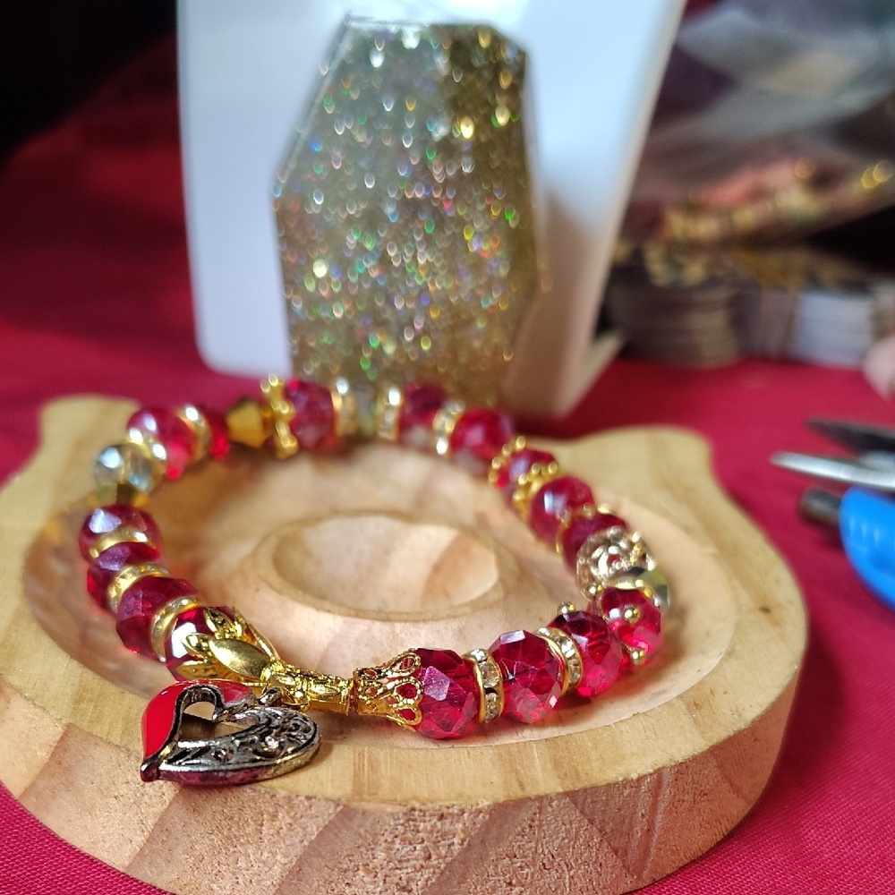 Red and Gold Beaded Bracelet with Ornate Accents